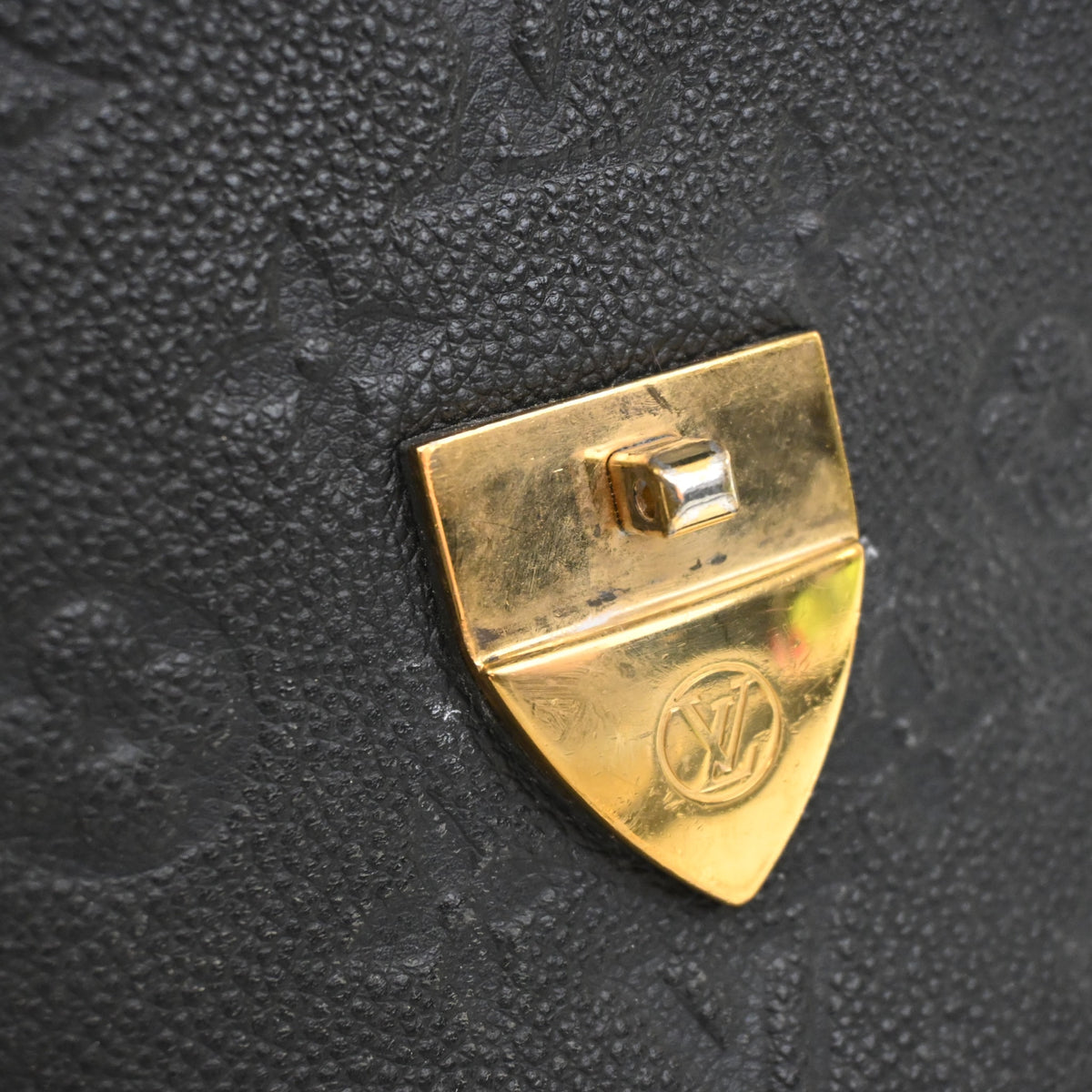 Pre-Owned Louis Vuitton PM Monogram Empreinte Saint Sulpice, gold hardware close-up, photo 18 of 19