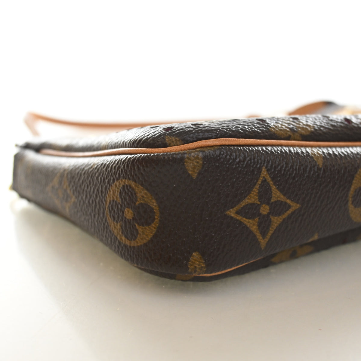 Vintage Louis Vuitton Pochette Monogram Perforated Accessoires, corner and edge detail, photo 10 of 16