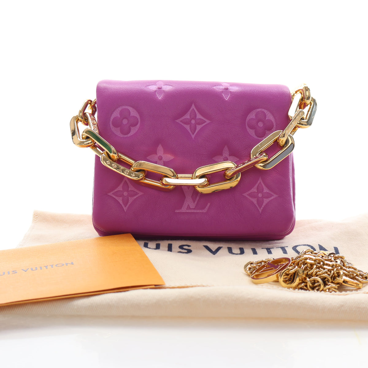 Pre-Owned Louis Vuitton Belt Bag Lambskin Coussin, shown with dust bag and packaging
