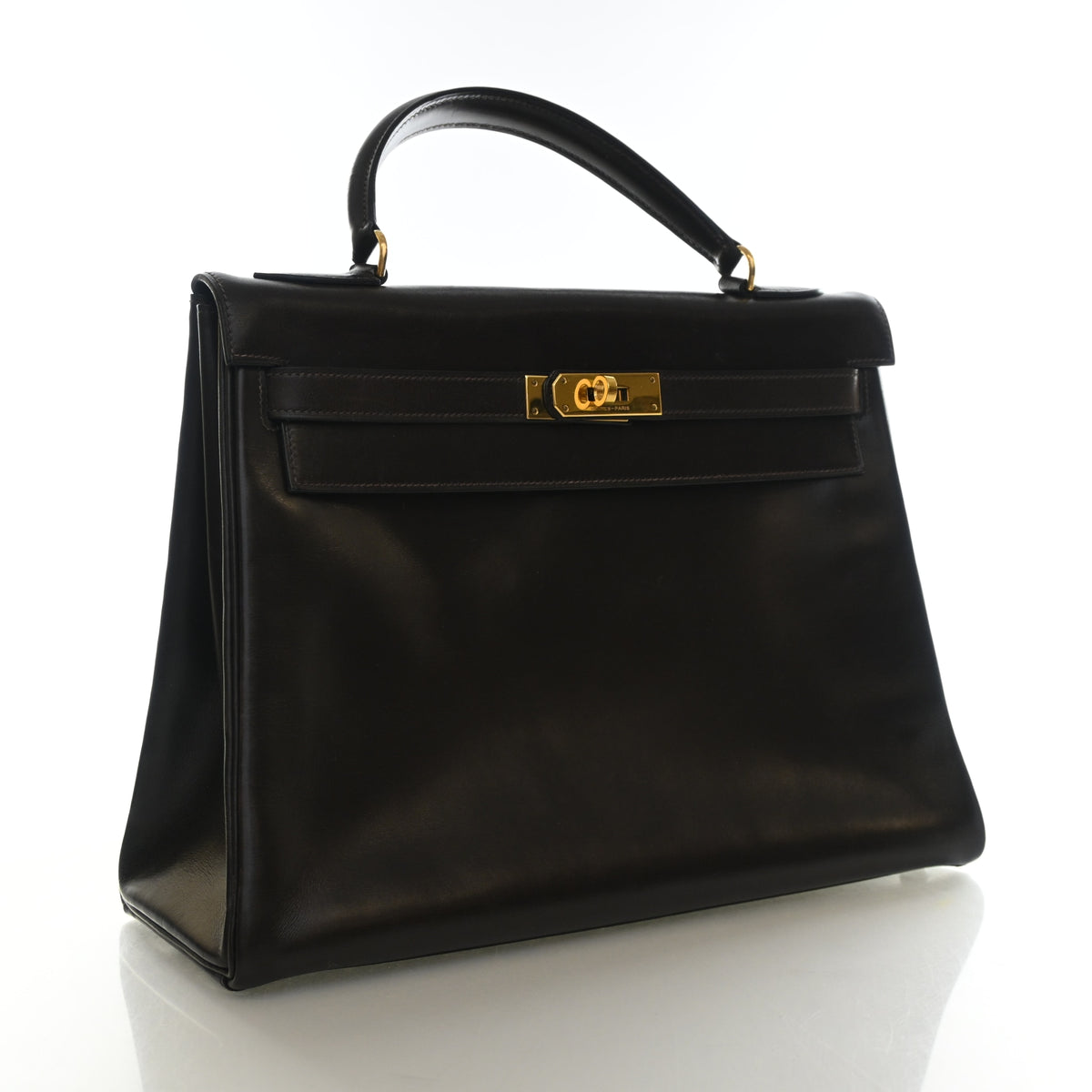Vintage Hermès Kelly 32 Chocolat Box Calf, three-quarter view, authenticated at Luxe Du Jour