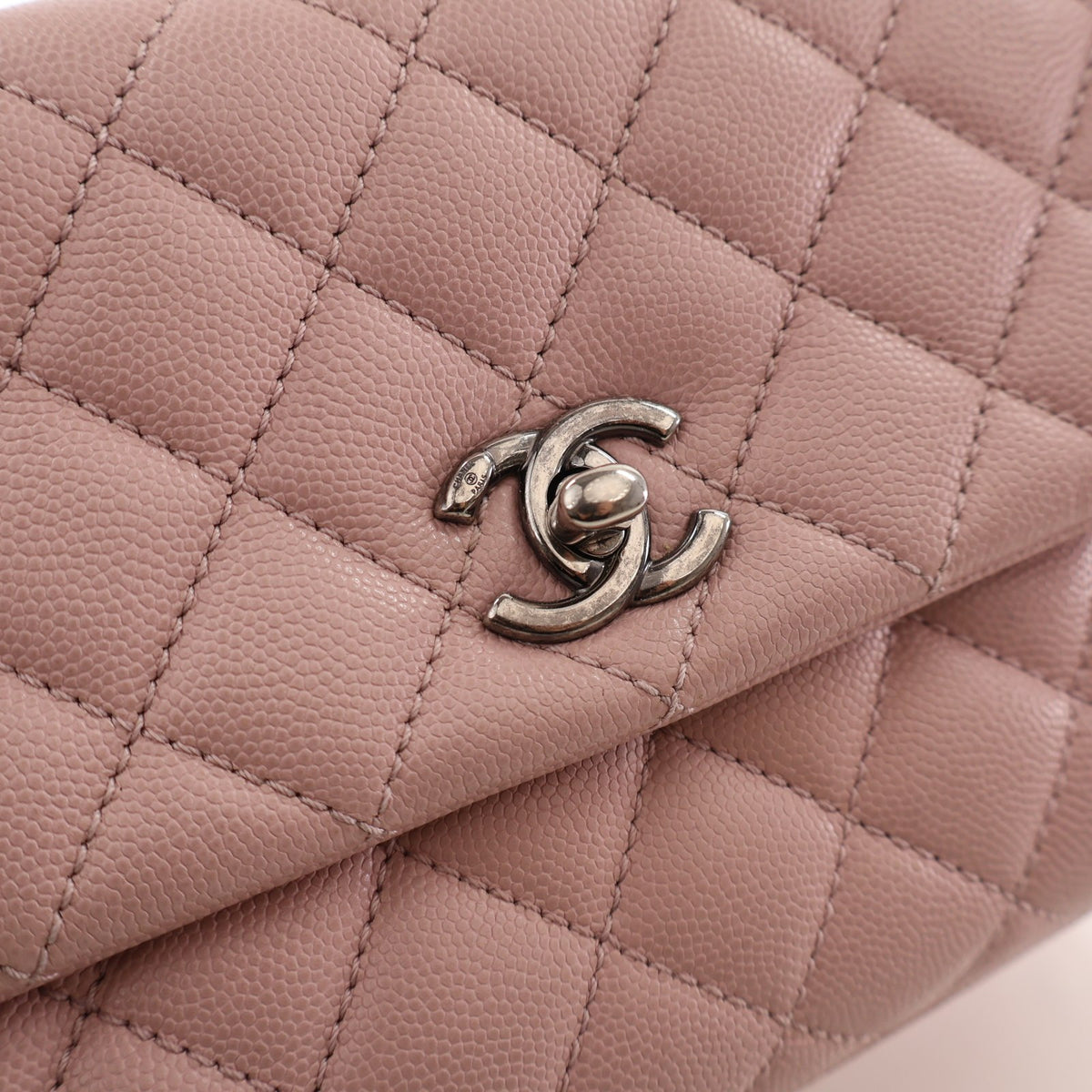 Pre-Owned Chanel Coco Handle Mini Caviar Leather Bag, silver hardware close-up