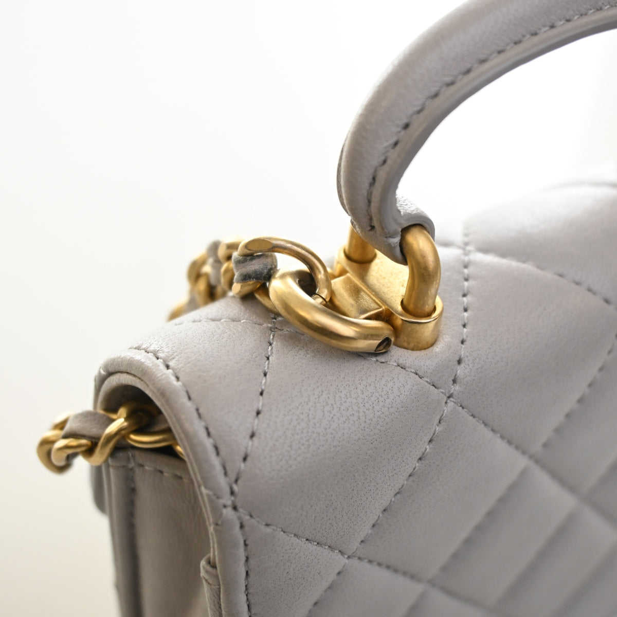 Pre-Owned Chanel Top Handle Mini Lambskin Flap Bag, gold hardware close-up, photo 13 of 19