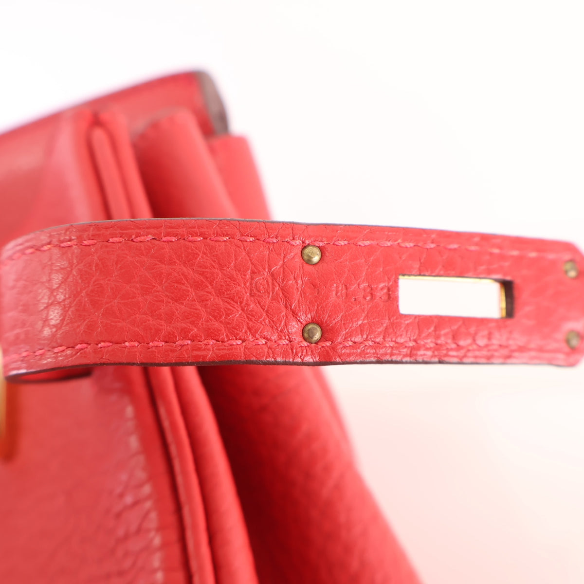 Pre-Owned Hermès Birkin 30 Rouge Casaque Clemence Leather, gold hardware close-up, photo 17 of 18