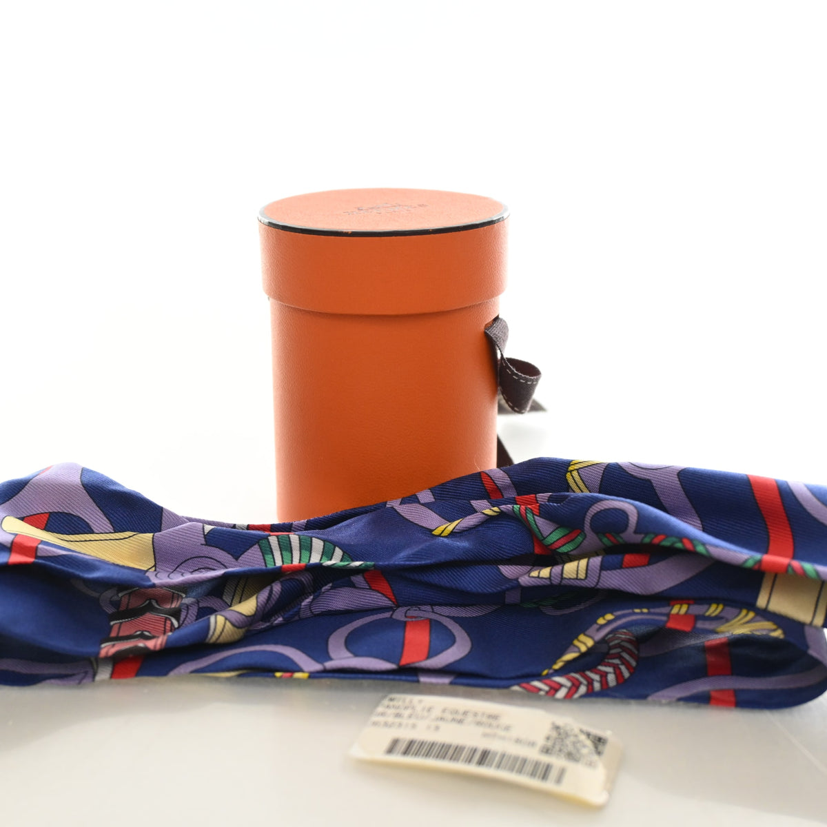 Pre-Owned Hermès Panoplie Equestre Silk Twilly, shown with dust bag and packaging