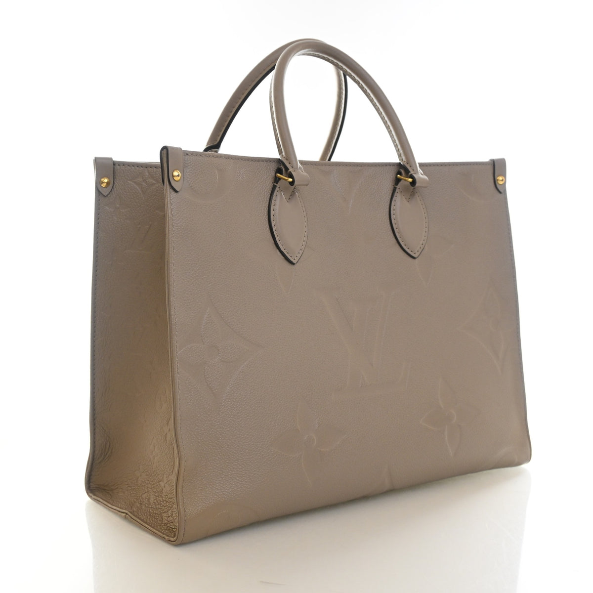 Pre-Owned Louis Vuitton Onthego MM Monogram Empreinte Giant, three-quarter view, authenticated at Luxe Du Jour