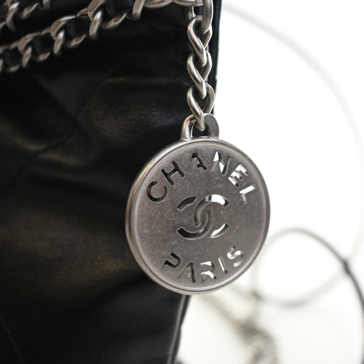Pre-Owned Chanel 22 Hobo Mini Calfskin, silver hardware close-up