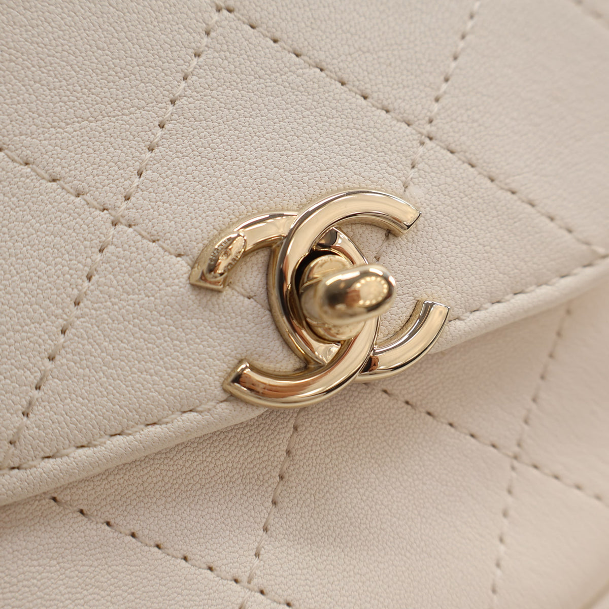 Pre-Owned Chanel Flap Bag Mini Goatskin Casual Trip, gold hardware close-up