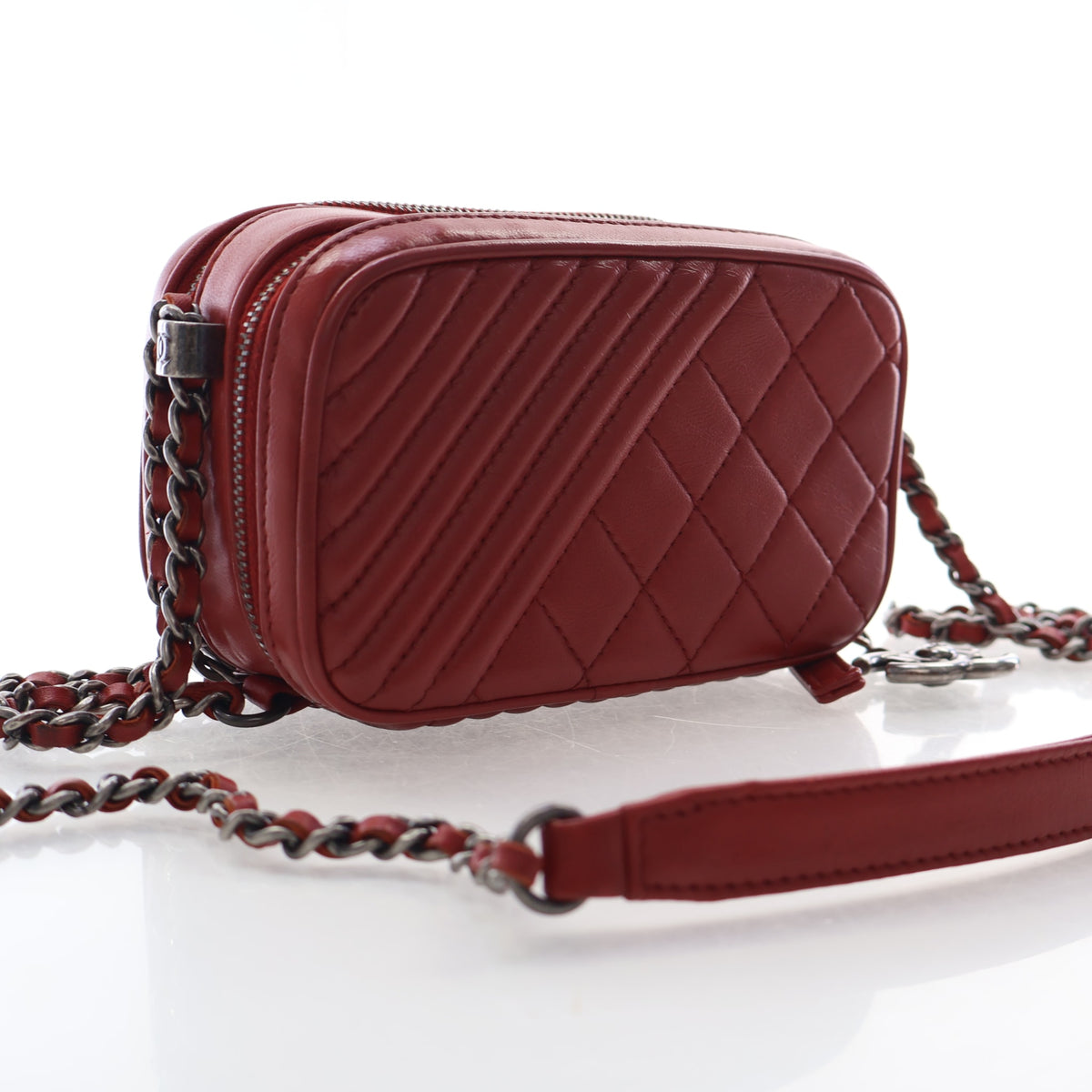 Pre-Owned Chanel Camera Bag Lambskin Coco Boy With Chain, three-quarter view, authenticated at Luxe Du Jour