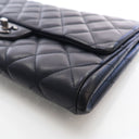Chanel Large Lambskin Clutc...