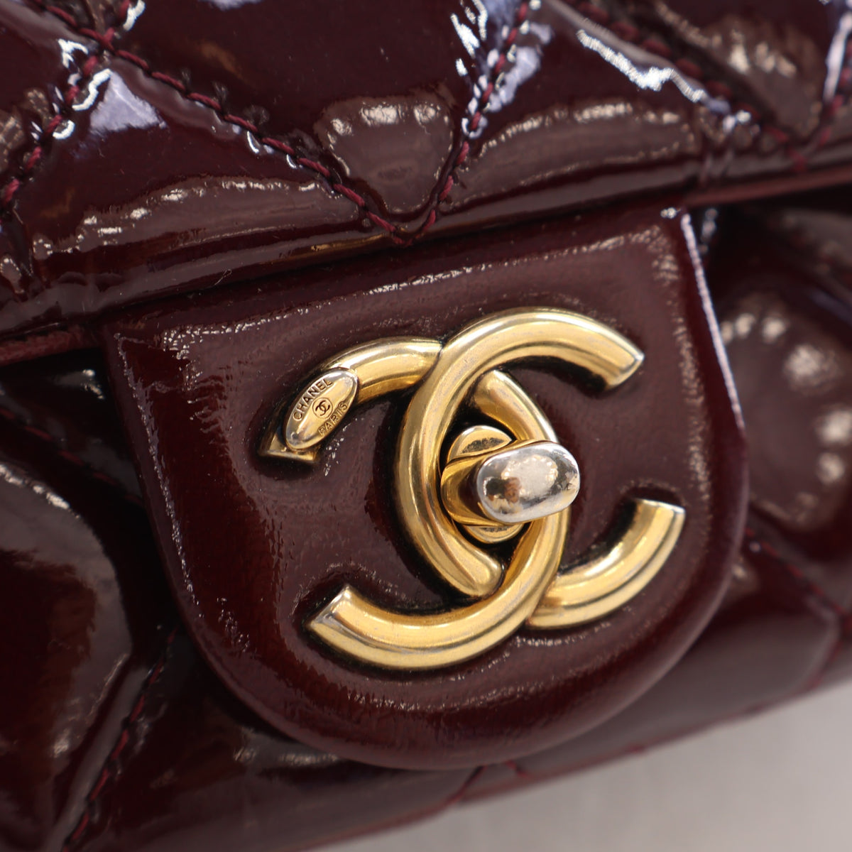 Pre-Owned Chanel Flap Bag Small Patent Leather Classic Single, gold hardware close-up