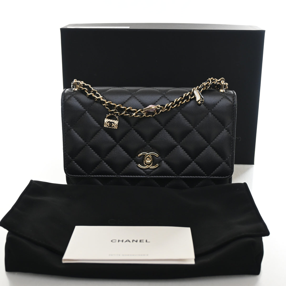 Pre-Owned Chanel Wallet On Chain Pearly Lambskin Charms WOC, shown with dust bag and packaging