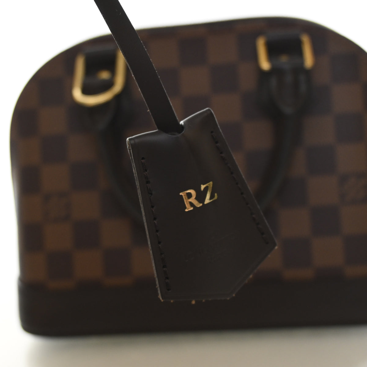 Pre-Owned Louis Vuitton Alma Damier Ebene BB, interior label and date code