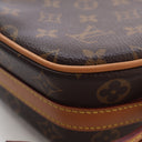 Louis Vuitton Petite Canvas...