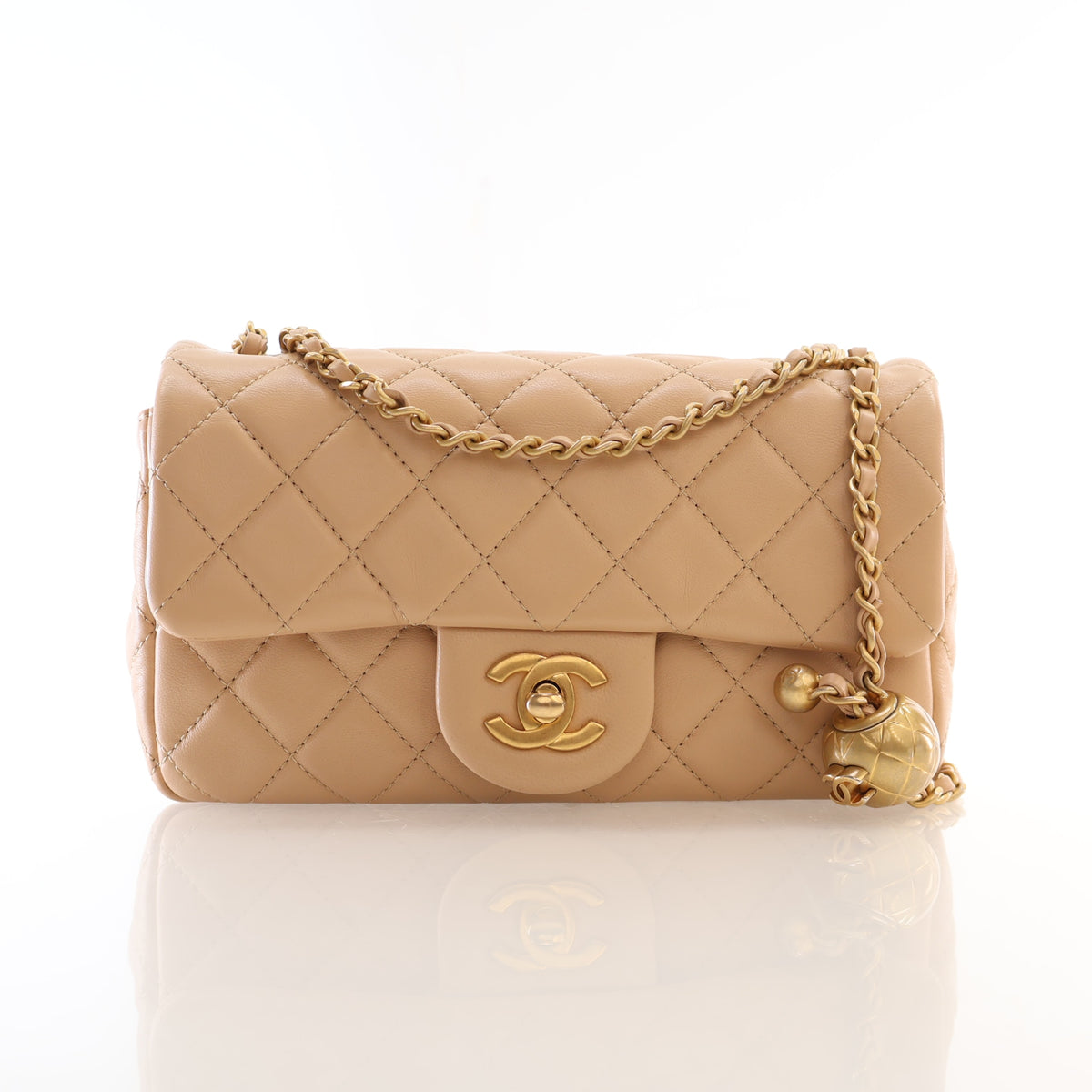 Pre-Owned Chanel Flap Bag Mini Lambskin Pearl Crush, front view, authenticated at Luxe Du Jour