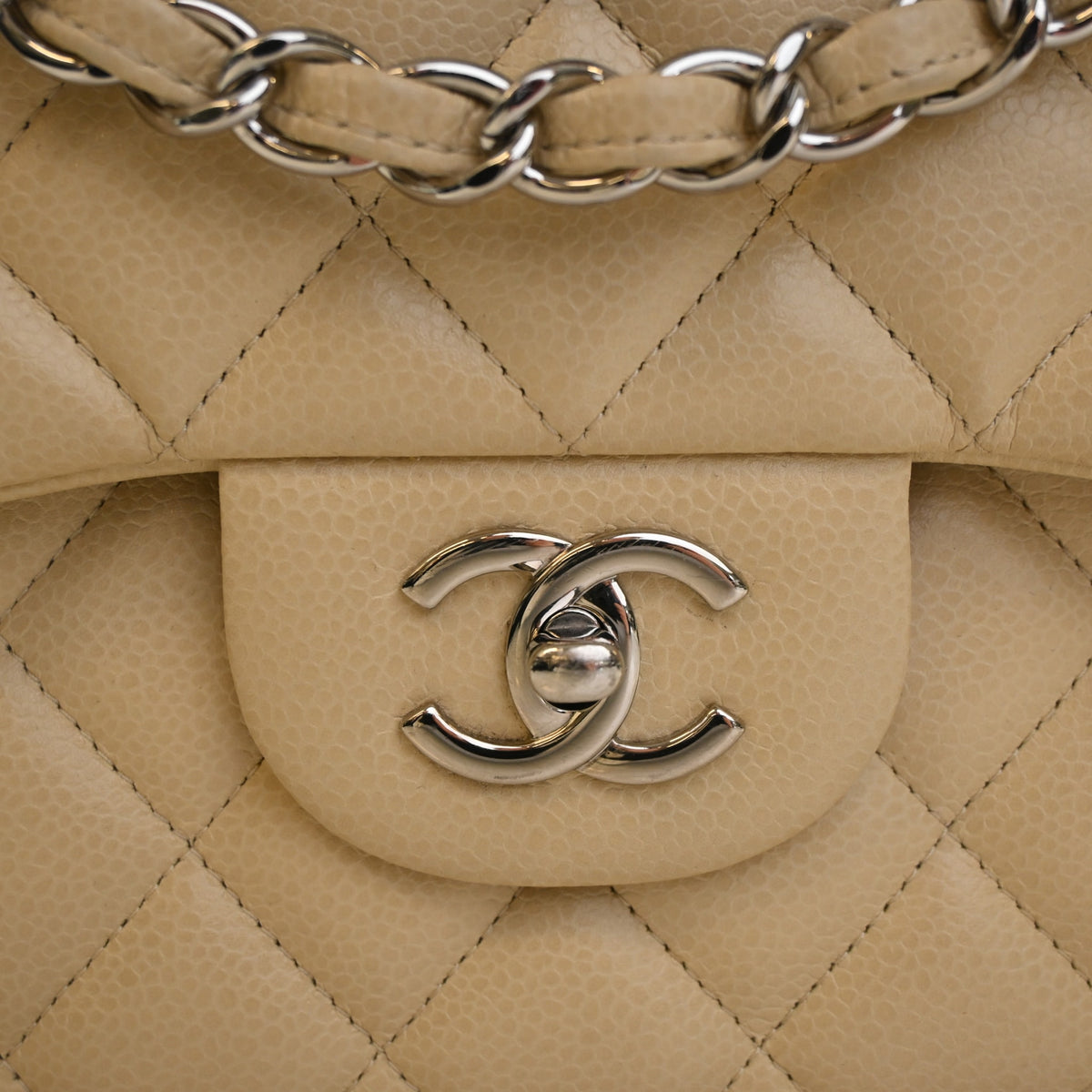 Pre-Owned Chanel Classic Double Flap Jumbo Caviar Leather Bag, silver hardware close-up