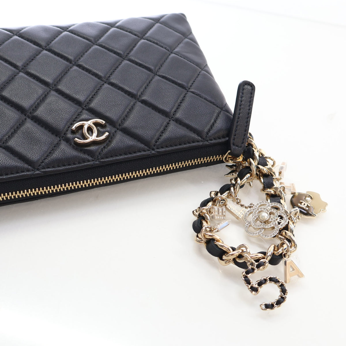 Pre-Owned Chanel Medium Lambskin Coco Charms Pouch, three-quarter view, photo 11 of 18