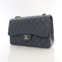 Chanel Jumbo Caviar Classic...