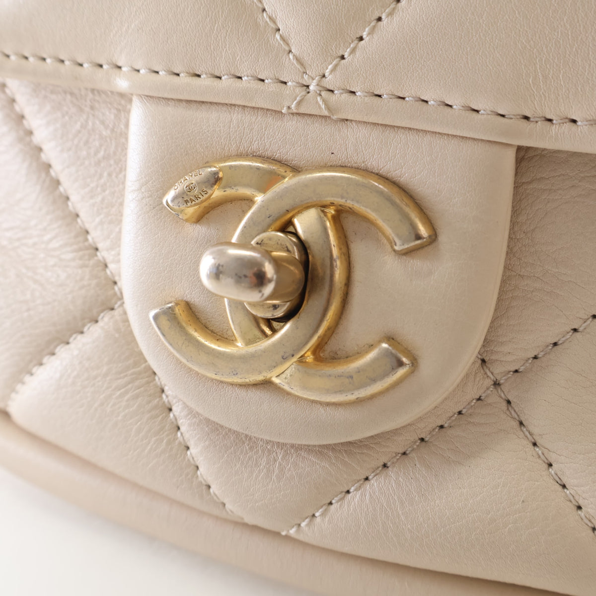 Pre-Owned Chanel Flap Bag Small Lambskin, gold hardware close-up