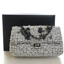 Chanel 224 Tweed Reissue 2....