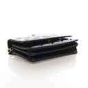 Chanel Mini Lambskin Wallet...