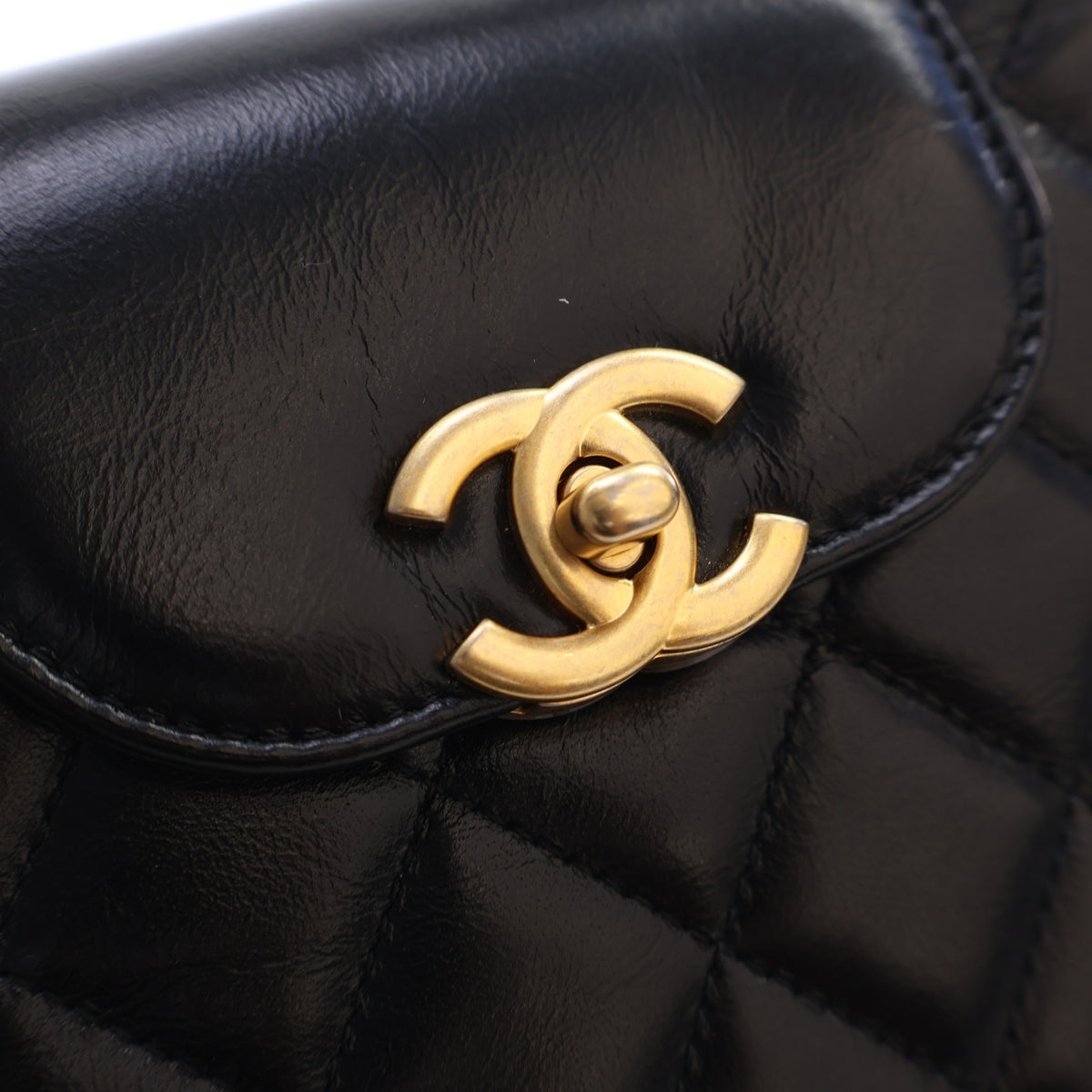 Pre-Owned Chanel Kelly Nano Aged Calfskin Shopper, gold hardware close-up