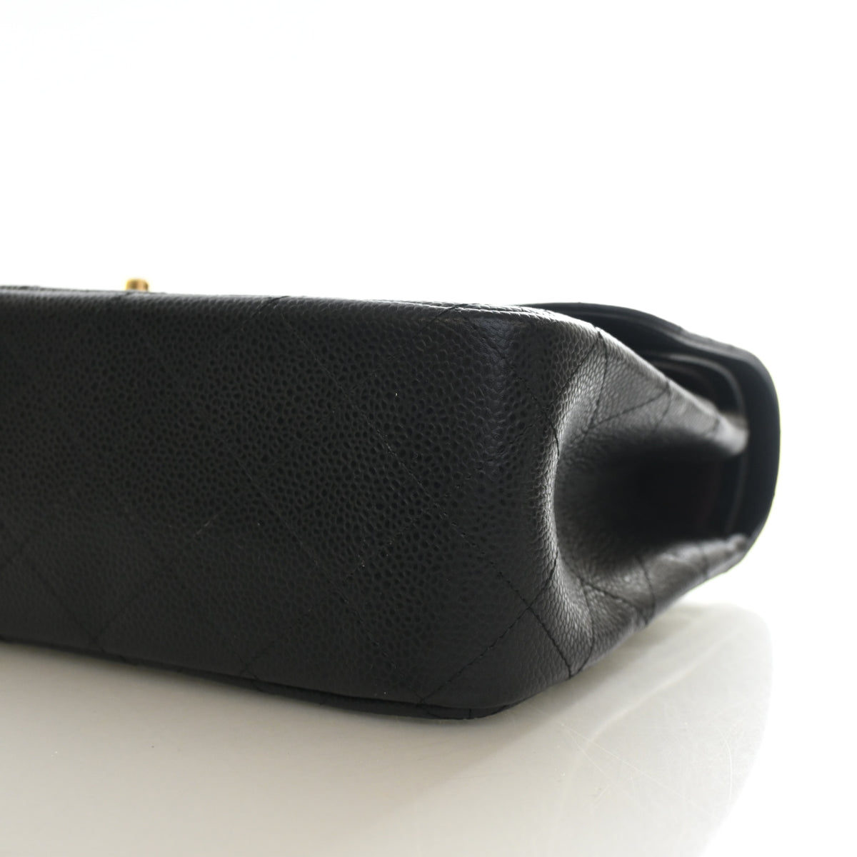 Pre-Owned Chanel Classic Double Flap Jumbo Caviar Leather Bag, base and feet view, photo 8 of 15
