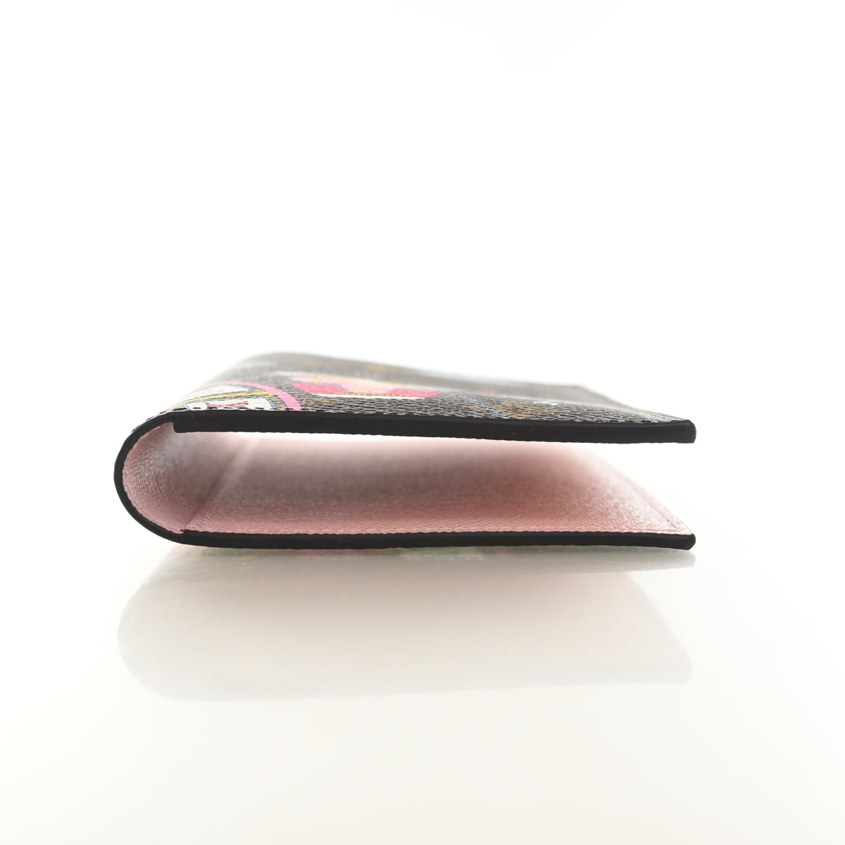Pre-Owned Louis Vuitton Monogram Holiday Animation Passport Holder, side profile, photo 9 of 12