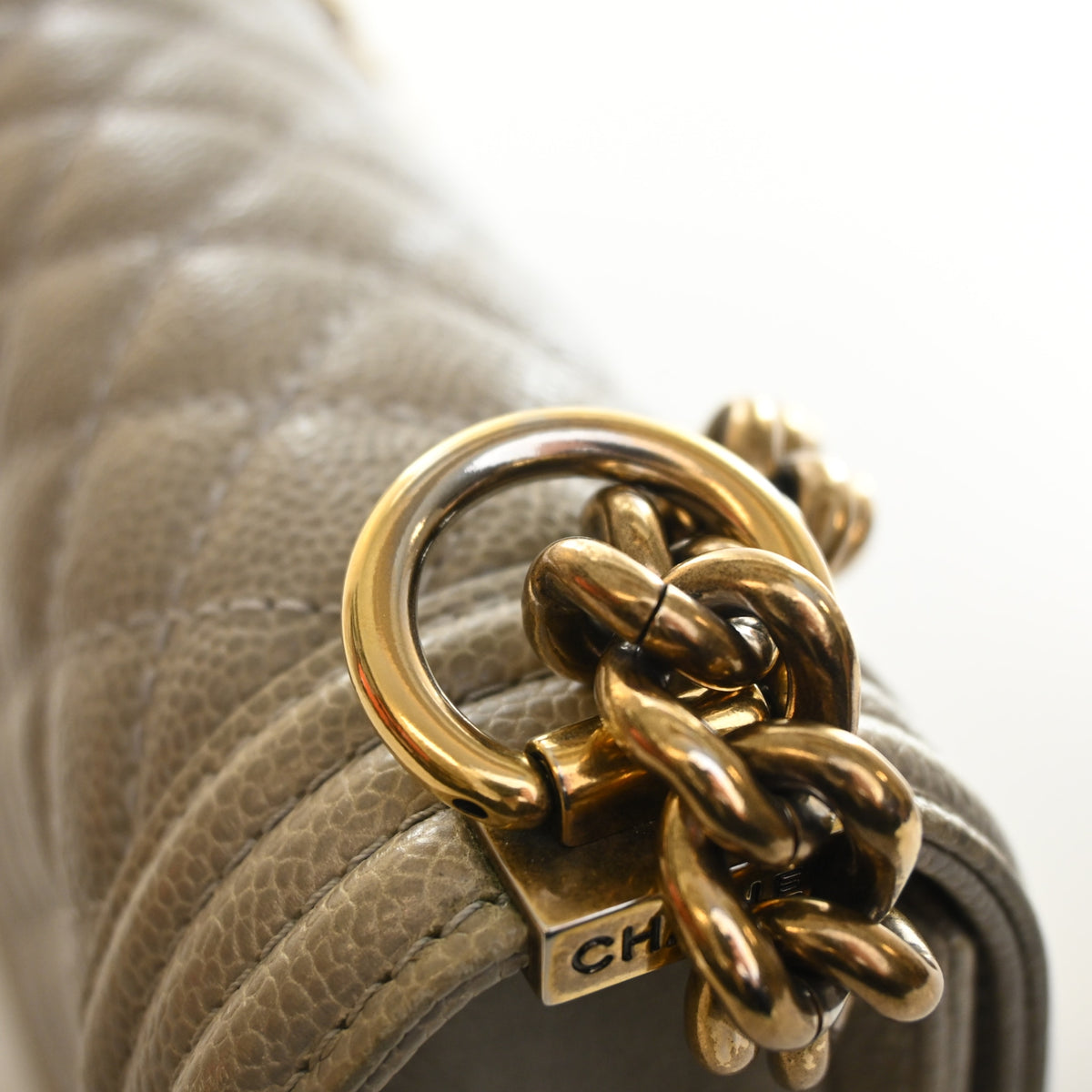 Pre-Owned Chanel Boy Bag Medium Caviar Leather, gold hardware close-up, photo 21 of 22