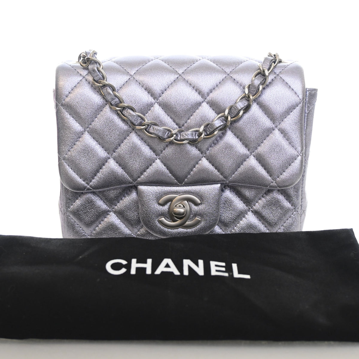 Pre-Owned Chanel Classic Flap Mini Calfskin Square Bag, shown with dust bag and packaging
