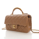 Chanel Mini Lambskin Flap B...