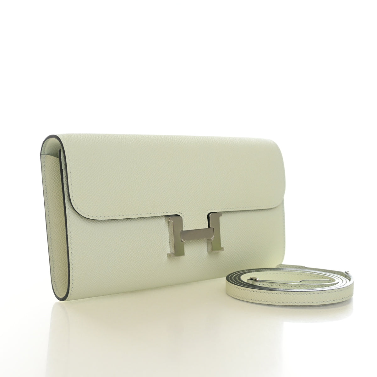 Pre-Owned Hermès Constance To Go Vert Fizz Epsom Leather Wallet, three-quarter view, authenticated at Luxe Du Jour