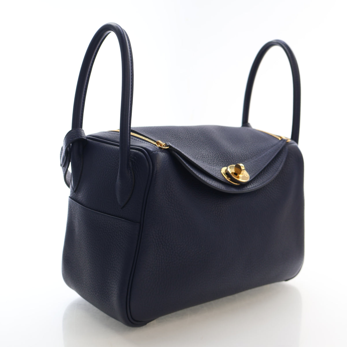 Pre-Owned Hermès Lindy 30 Bleu Nuit Clemence Leather, side profile, authenticated at Luxe Du Jour