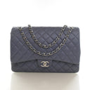 Product - Chanel Maxi Lambs...