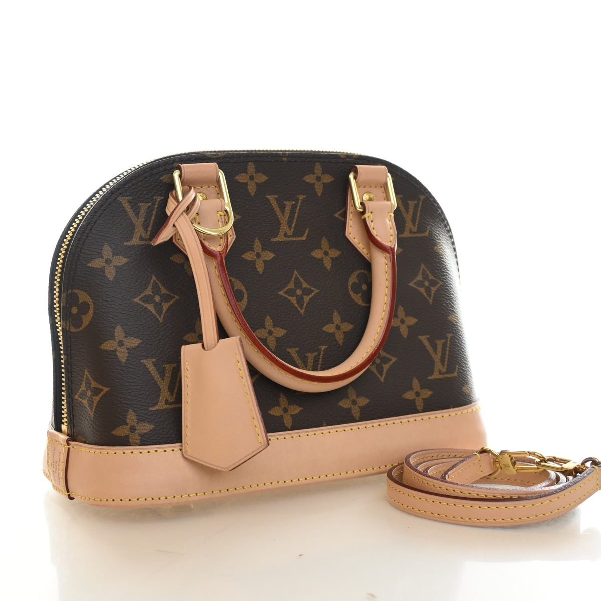 Pre-Owned Louis Vuitton Alma Monogram BB, three-quarter view, authenticated at Luxe Du Jour