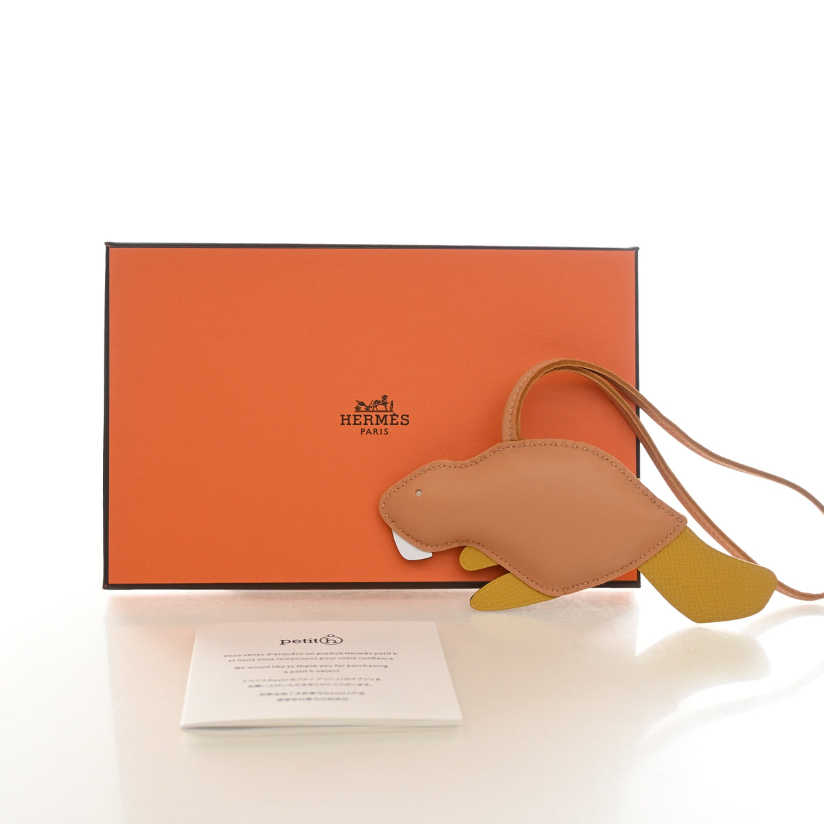 Pre-Owned Hermès Charm Milo Lambskin Petit H Beaver, shown with dust bag and packaging