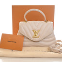 Louis Vuitton Calfskin Hold...