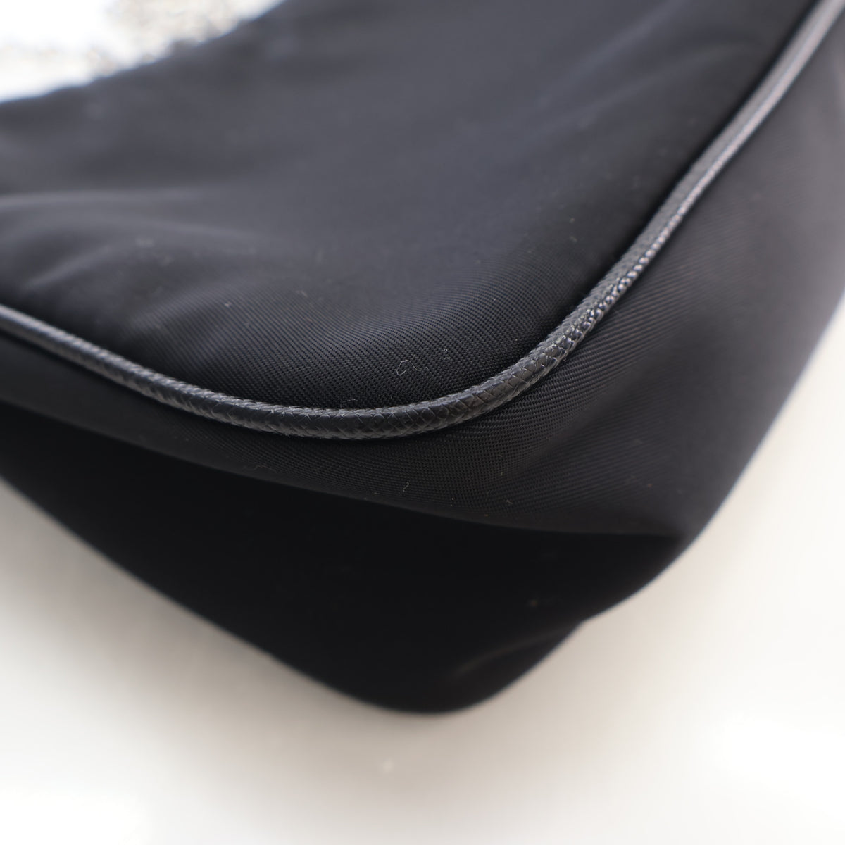 Pre-Owned Prada Mini Re-nylon Re-edition 2000, corner and edge detail, photo 14 of 18