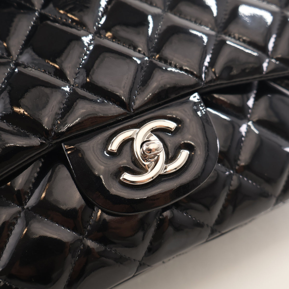 Pre-Owned Chanel Classic Double Flap Jumbo Patent Leather Bag, silver hardware close-up