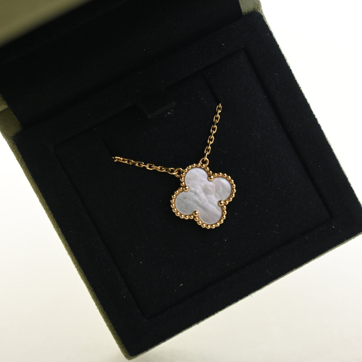 Vintage Van Cleef & Arpels Alhambra Mother Of Pearl Pendant, shown with dust bag and packaging, photo 7 of 8