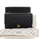 Chanel Jumbo Caviar Classic...