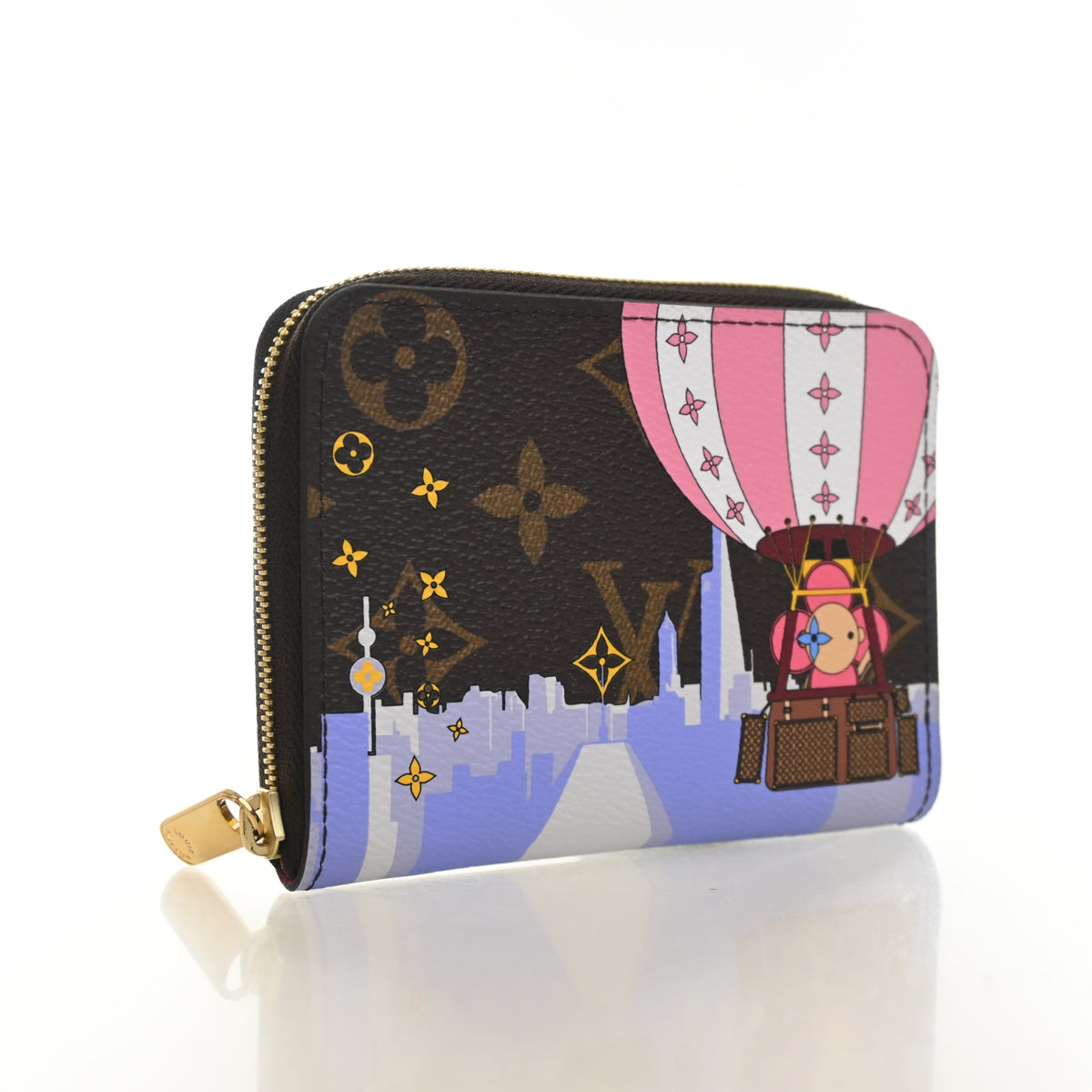 Pre-Owned Louis Vuitton Monogram Christmas Animation Zippy Coin Purse, three-quarter view, authenticated at Luxe Du Jour