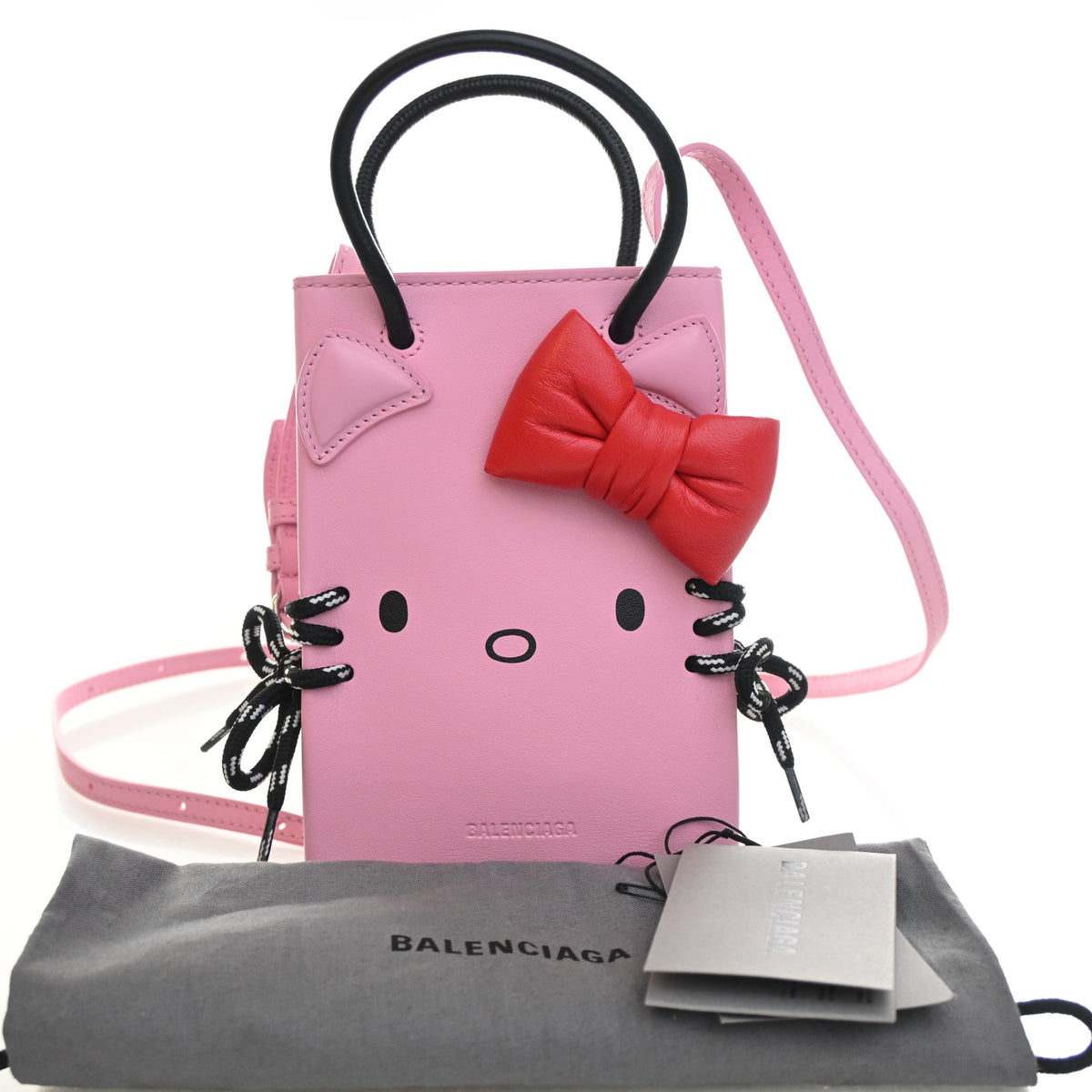 Pre-Owned Balenciaga Phone Holder X Hello Kitty Goatskin Bag, shown with dust bag and packaging