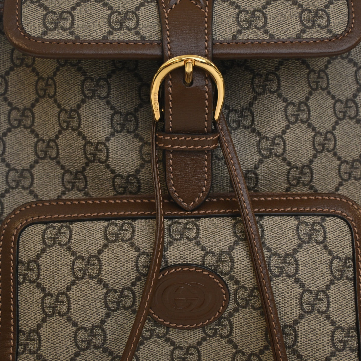 Pre-Owned Gucci Backpack GG Supreme Azalea Retro Interlocking G Buckle, gold hardware close-up