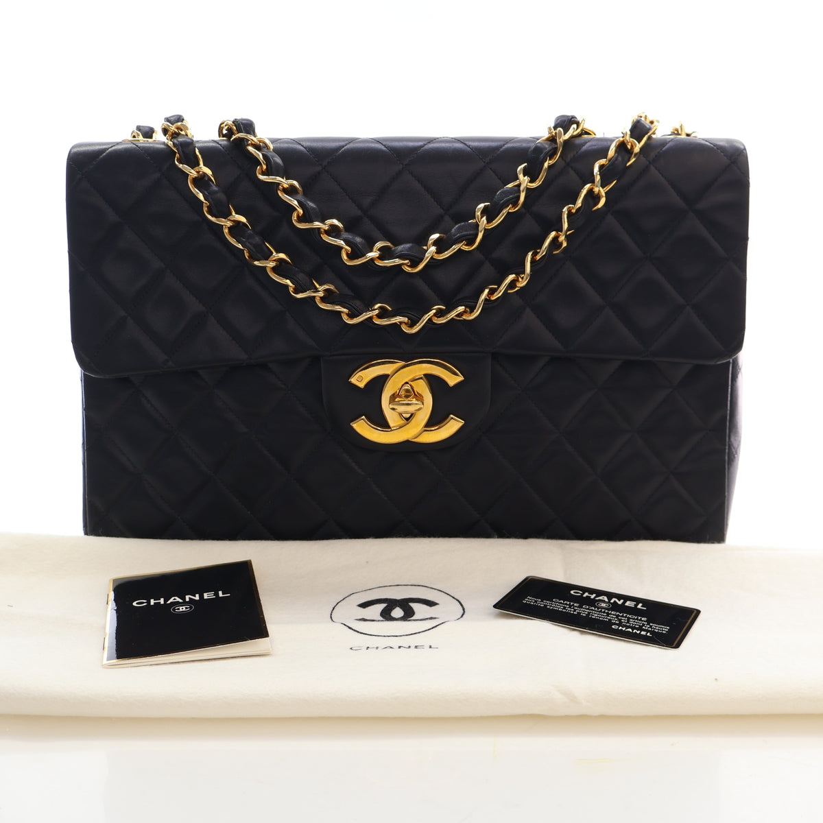 Vintage Chanel Flap Bag Maxi Lambskin Classic Single, shown with dust bag and packaging