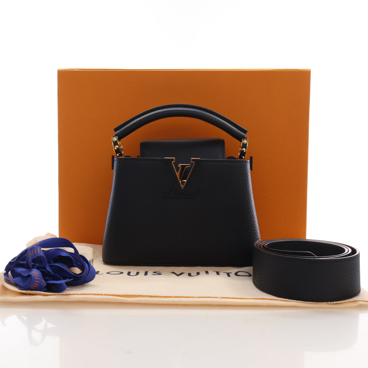 Pre-Owned Louis Vuitton Mini Taurillon Capucines, shown with dust bag and packaging